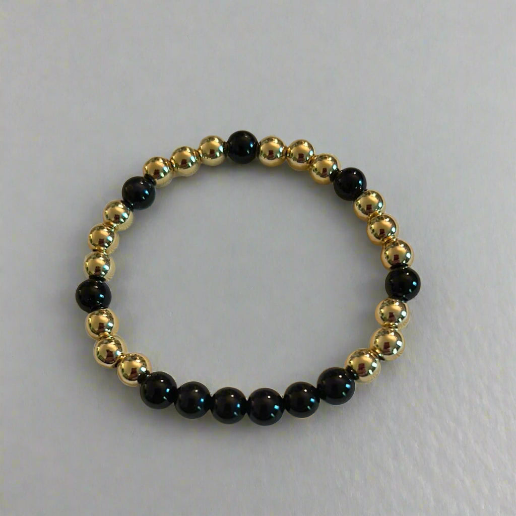 Gold Bead with Black Bracelet