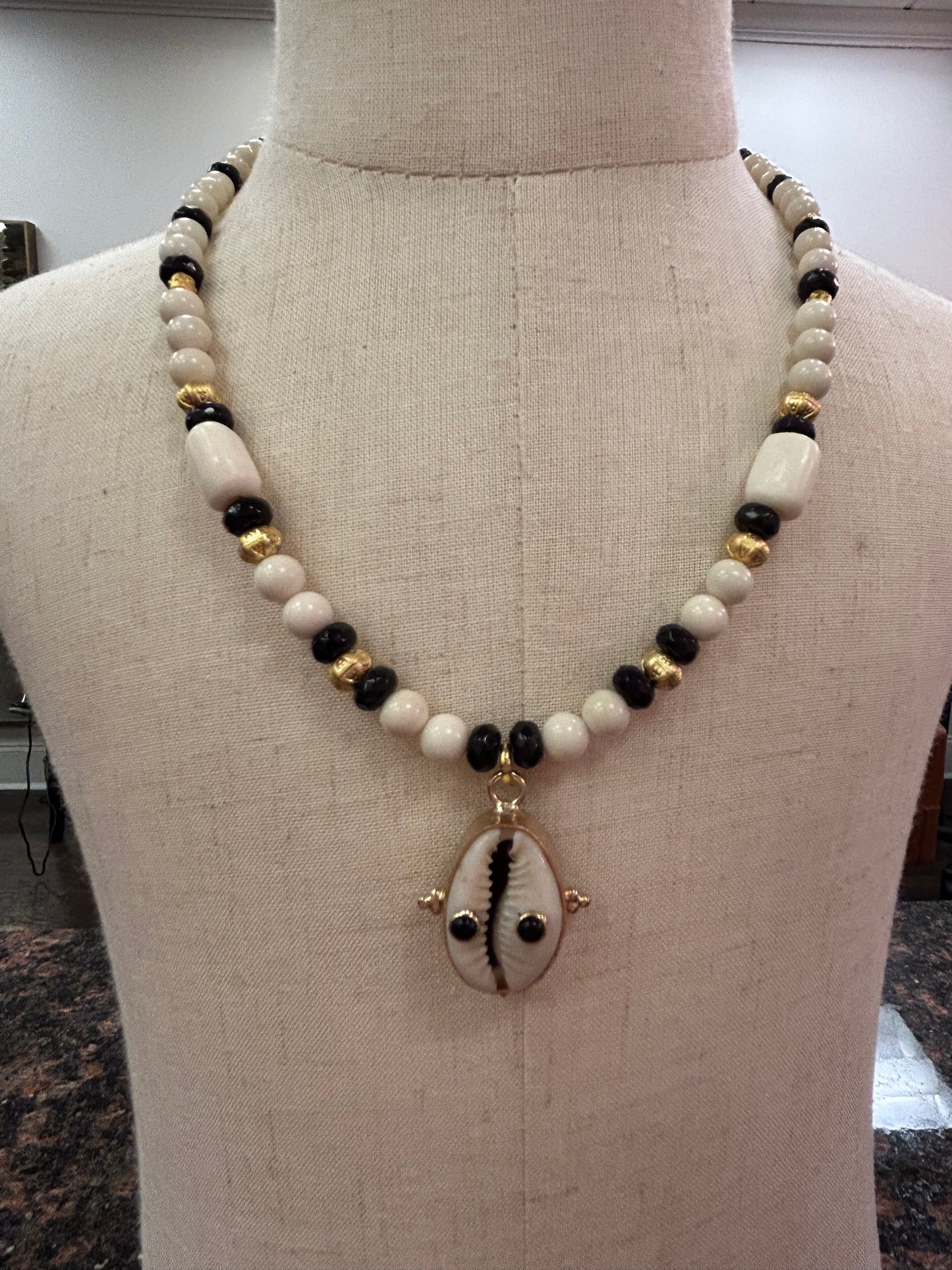 Natural Cowrie Shell with Black Onyx Gemstones
