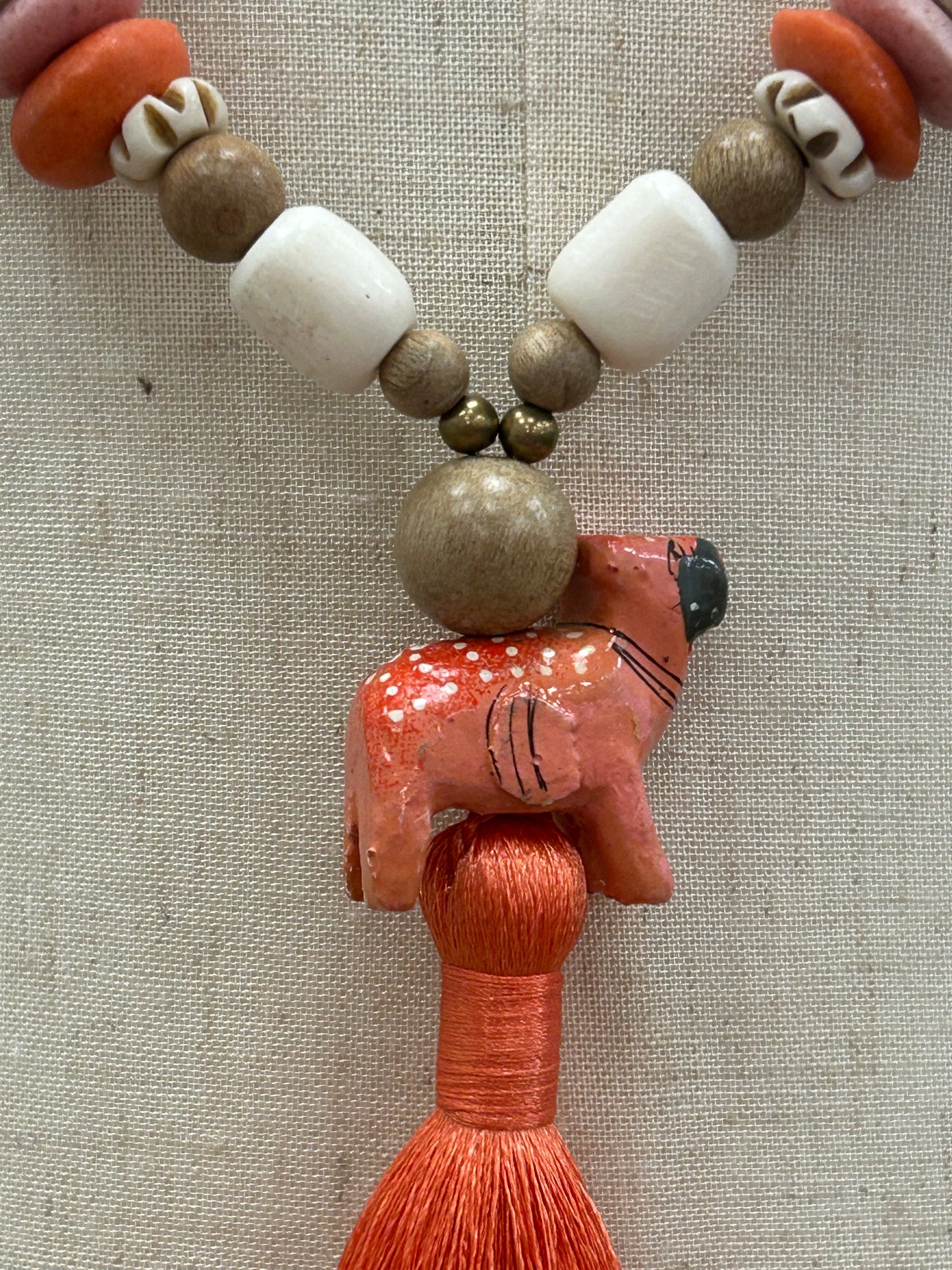 Animal and Wood Bead Necklace with Coral Tassel