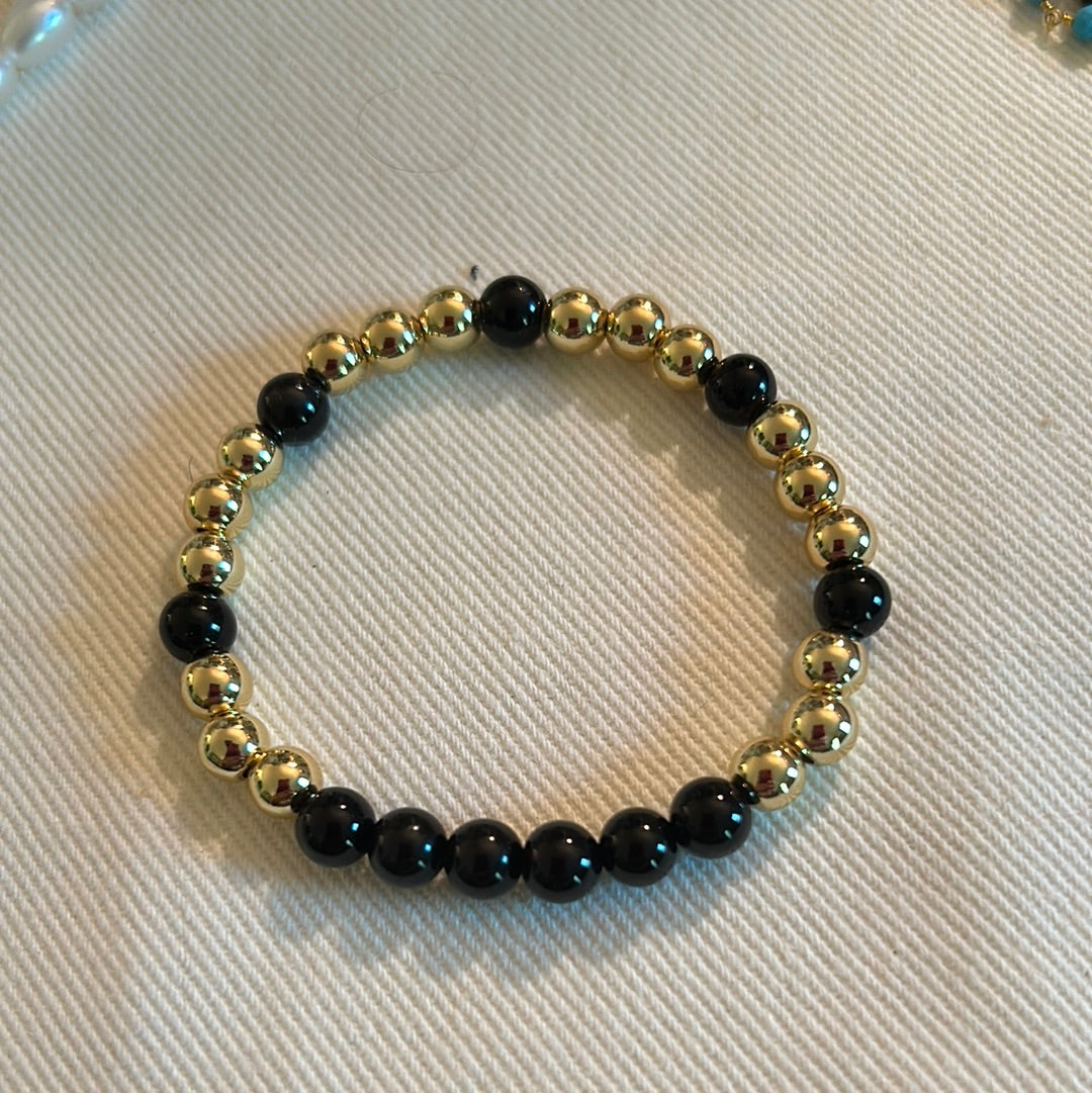 Gold Bead with Black Bracelet