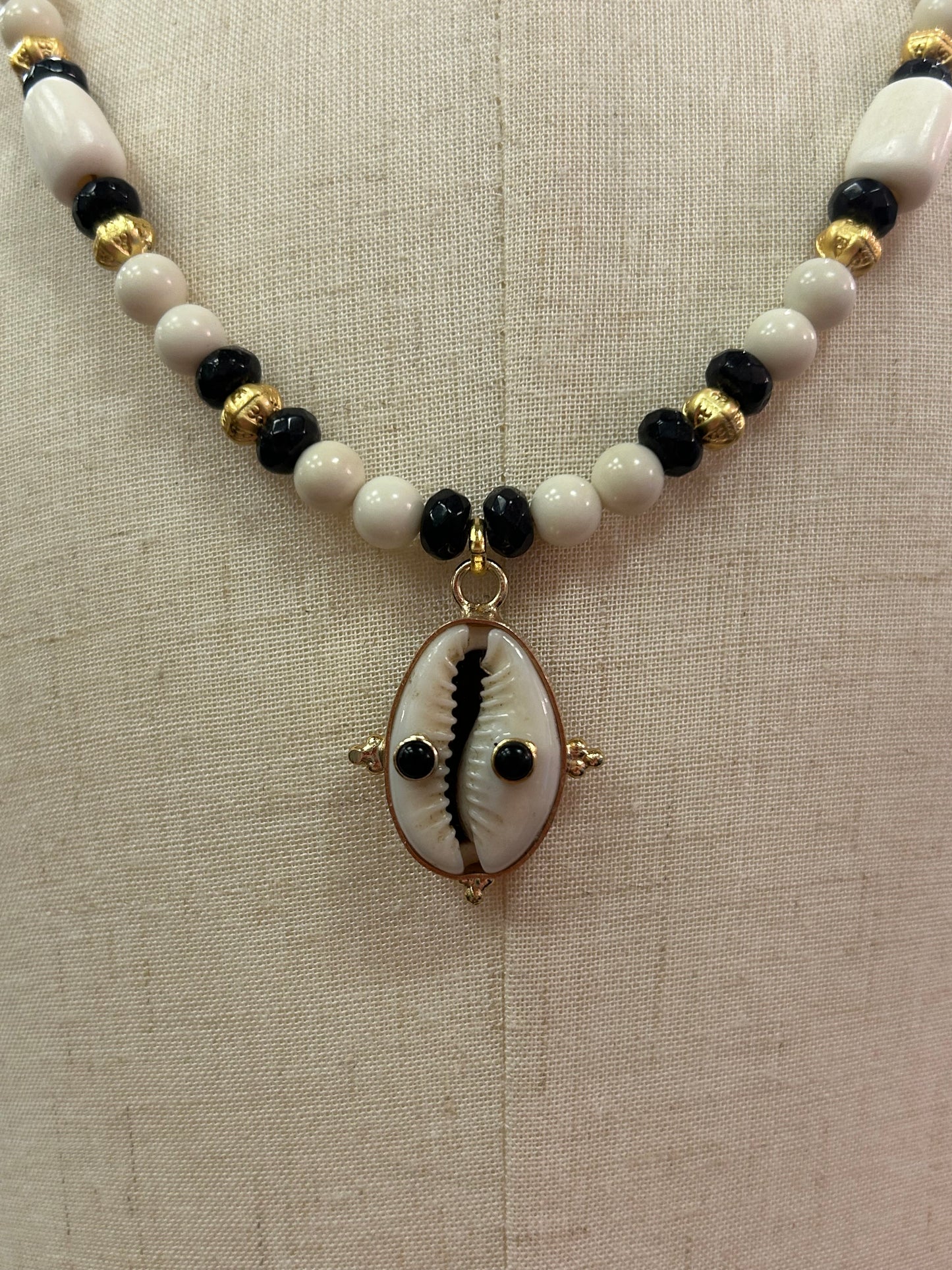 Natural Cowrie Shell with Black Onyx Gemstones